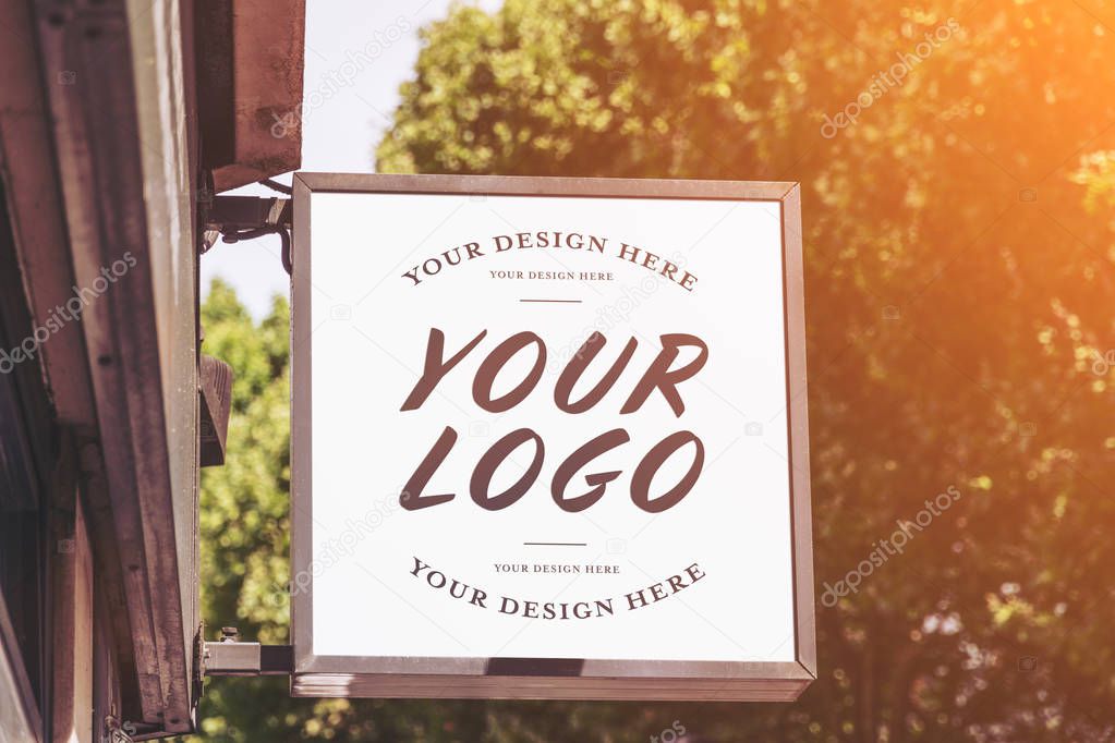 Store brand sign mockup in street