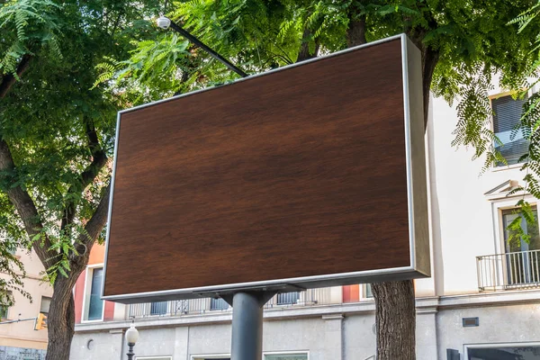 Outdoor horizontal billboard with natural city landscape mockup