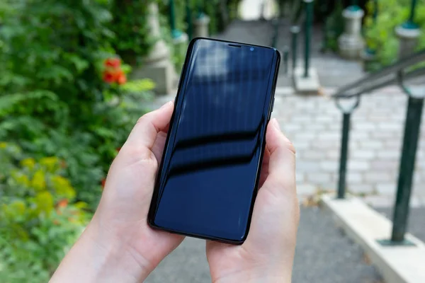 Woman Holding Modern Smartphone Green Park Summer Mockup — Stock Photo, Image