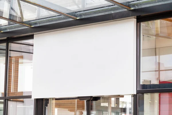 Outdoor horizontal sign on shop front window mockup