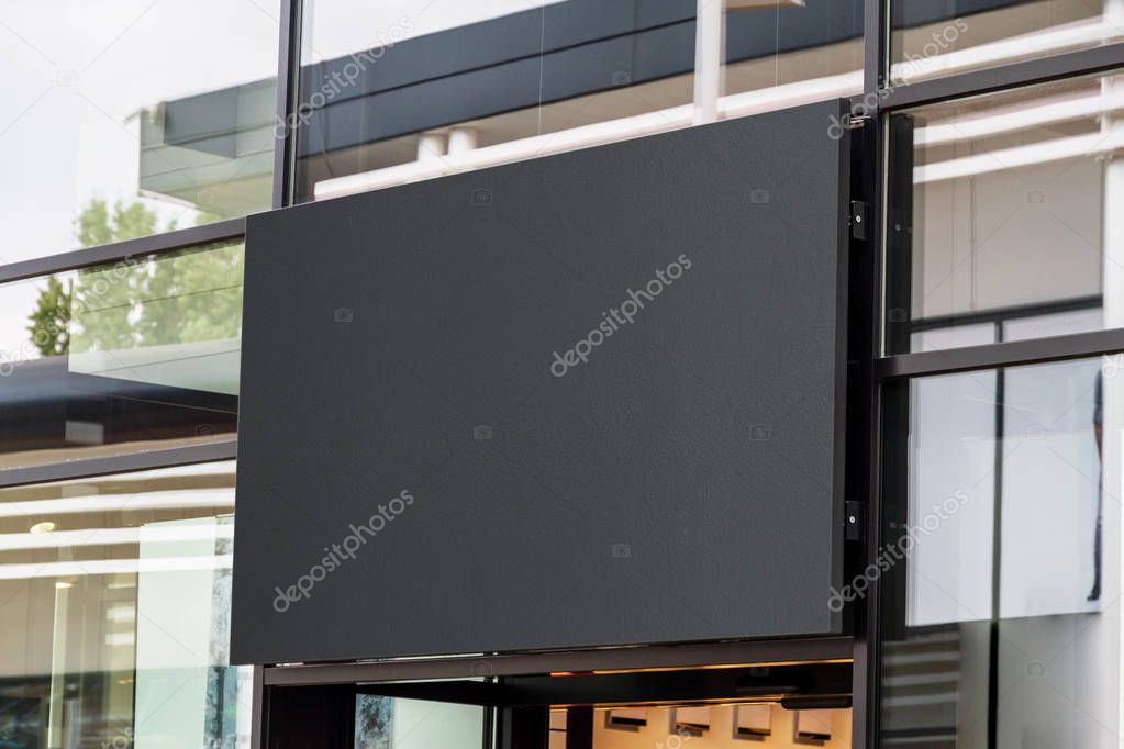 Outdoor horizontal sign on shop front window mockup