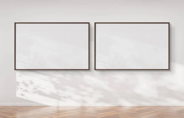 Zwei Horizontale Rahmen Die Einer Weißen Wandattrappe Hängen — Stockfoto