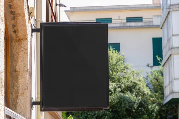 Store brand sign mockup in street with natural landscape