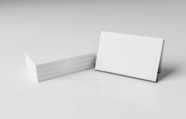 White business card stack on white desk 3D rendering — Stock Photo, Image