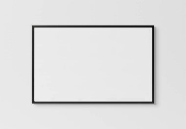 Beyaz duvar mocku üzerinde asılı siyah dikdörtgen yatay çerçeve
