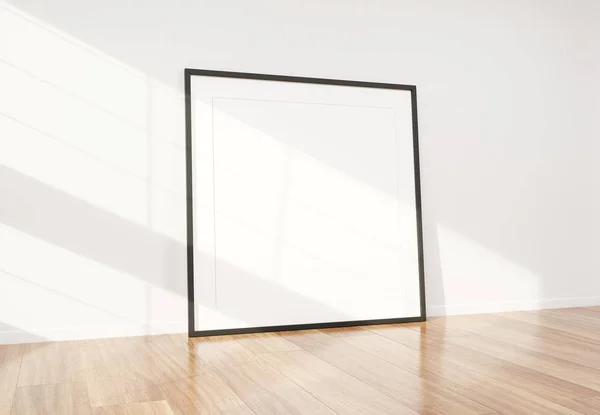Telaio nero appoggiato in luminoso interno bianco con pavimento in legno m — Foto Stock