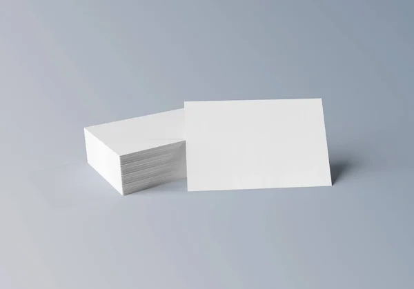Stack of white business cards mockup isolated on grey 3d renderi — Stock Photo, Image