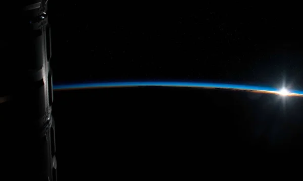 View of planet Earth horizon from a space station window during