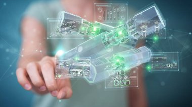 Arka planda bulanık duran ve yeşil yenilenebilir enerji bataryasına dokunan bir kadın.