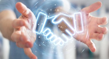 Bulanık arkaplanda, ortaklık neon mavi arayüz 3D görüntüleme kullanan bir adam.