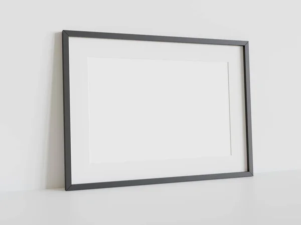 内部モックアップの白い床にもたれて黒の長方形のフレーム 壁に額装された画像のテンプレート3Dレンダリング — ストック写真