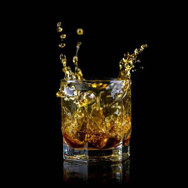 Glass Splashing Whiskey Other Alcohol Ice Cube Isolated Black Background — Stock Photo, Image