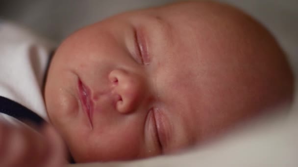 Close-up portrait of a beautiful sleeping baby — Stock Video