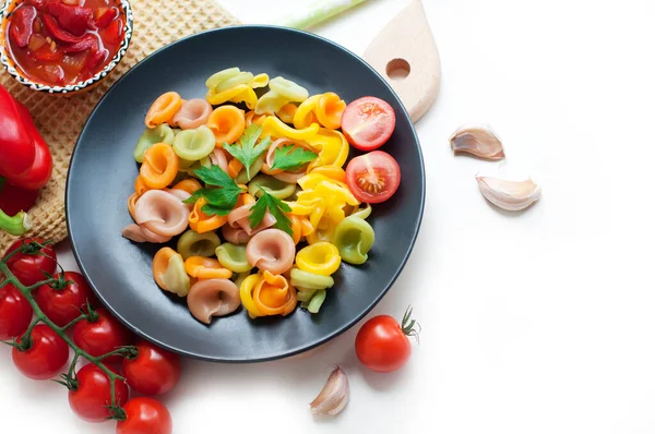 Colorful Pasta Tomatoes Garlic Parsley Pepper Black Plate Pasta Child — Stock Photo, Image