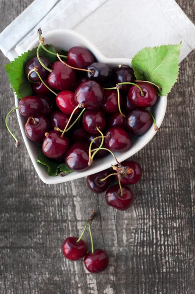 Sweet Cherries Green Leaves Bowl Wooden Background Top View — Stock Photo, Image