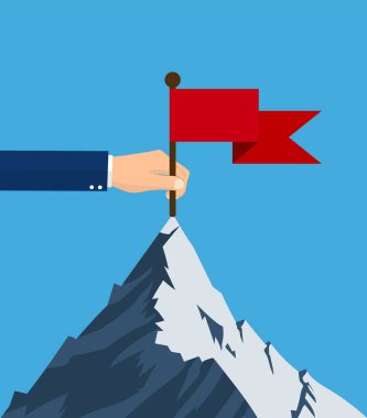 Dağ tepe üzerinde kırmızı bayrak ile ayakta.