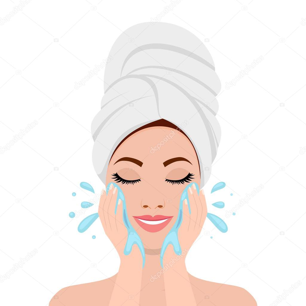 Beautiful woman in process of washing face