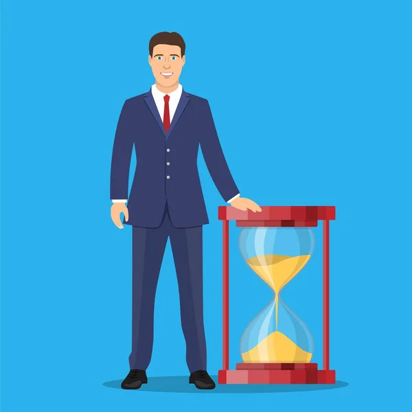 Empresario con reloj de arena . — Vector de stock