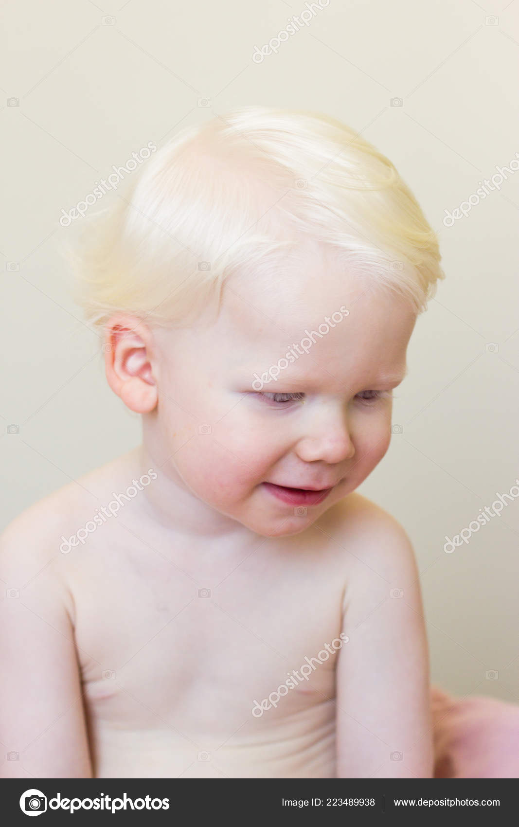 Whitehair babyboy with albinism syndrome on white Stock Photo by ©Iraidka  223489938