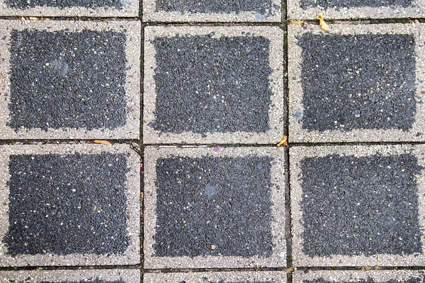 Pavimento ciottoli senza soluzione di continuità texture sfondo — Foto Stock