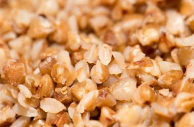 karabuğday kabuğu çıkarılmış tane arka plan olarak. kapatın. Fotoğraf soyut dokular