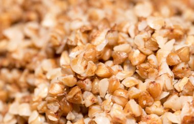 karabuğday kabuğu çıkarılmış tane arka plan olarak. Kapat