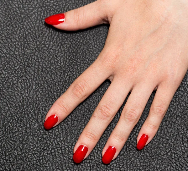 Hand with red manicure — Stock Photo, Image