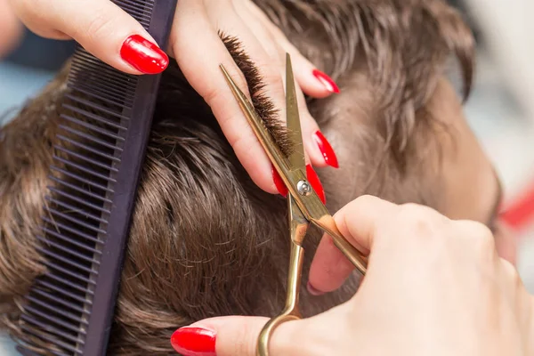 Mens hair cutting scissors in a beauty salon — Stock Photo, Image