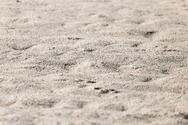 Achtergrond van zand aan de oever — Stockfoto