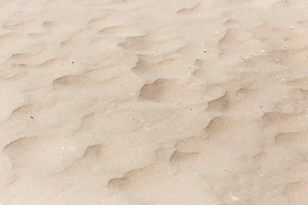 Sand als Hintergrund — Stockfoto