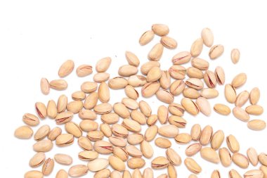 beyaz zemin üzerine Antep fıstığı. Kapat