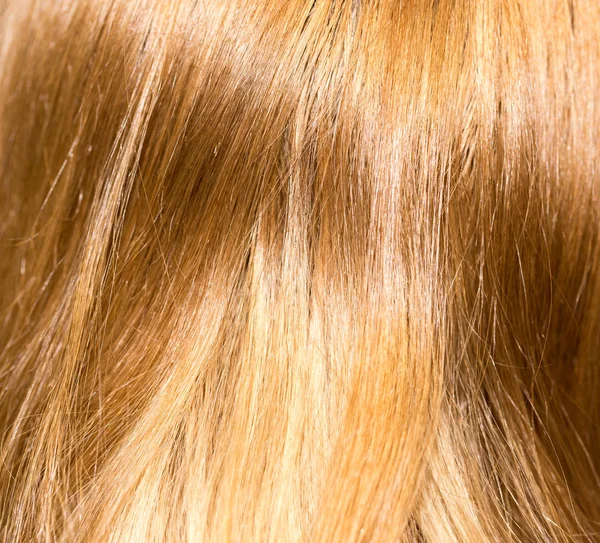 Lang blond haar als achtergrond — Stockfoto