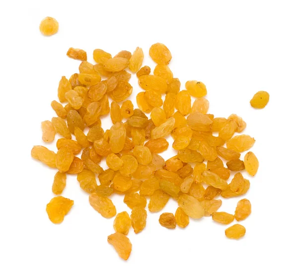 Beyaz zemin üzerine altın kuru üzüm — Stok fotoğraf
