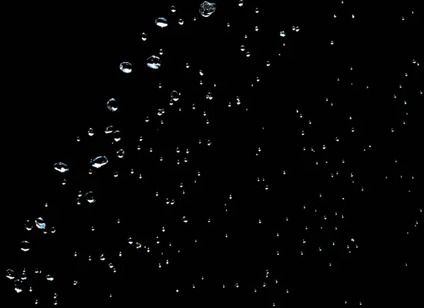 Gotas de água no fundo preto — Fotografia de Stock