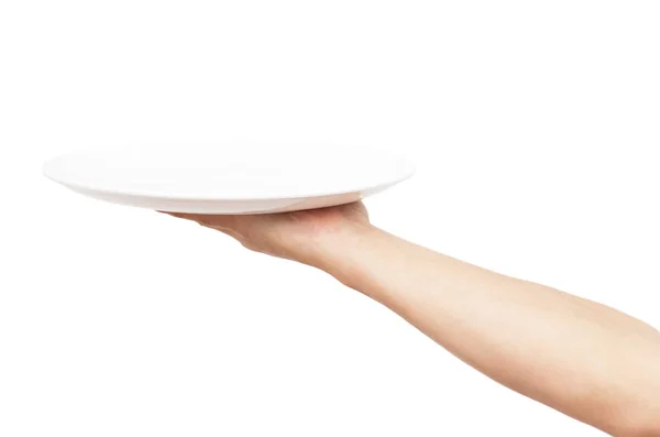 White plate in his hand on a white background — Stock Photo, Image