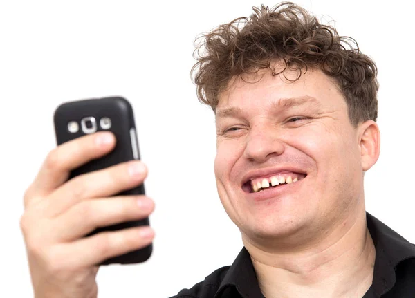 Hombre con teléfono sobre un fondo blanco —  Fotos de Stock
