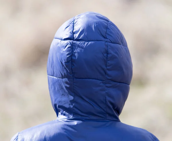 Jacket with a hood on a man — Stock Photo, Image
