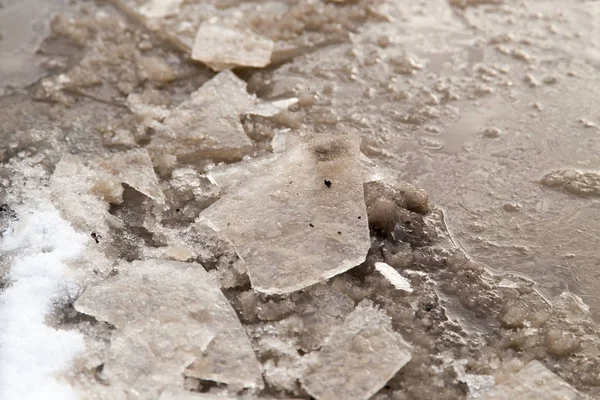 Winter ijs op de grond als achtergrond — Stockfoto