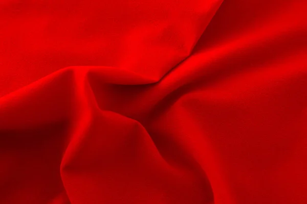 Красная ткань в качестве фона — стоковое фото
