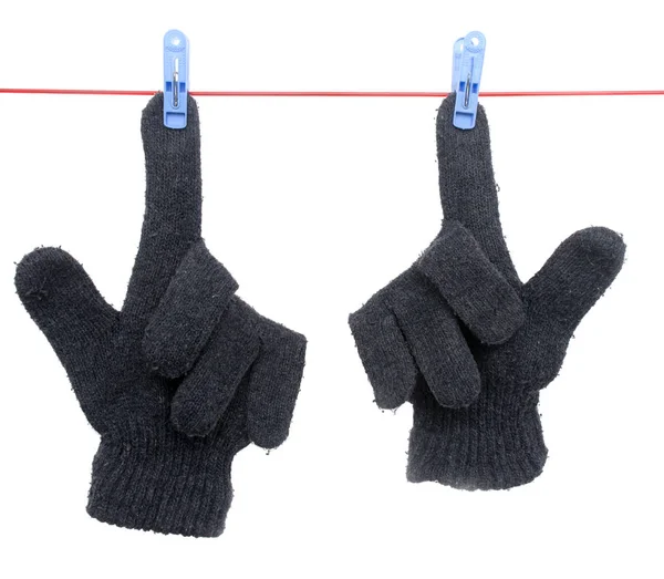 Glove on a rope on a white background — Stock Photo, Image