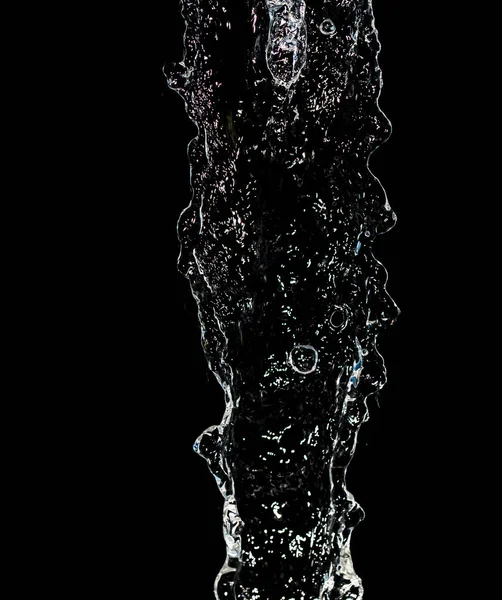 Spray water on a black background — Stock Photo, Image