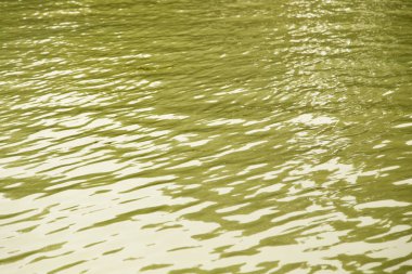 Suyun sarı yüzeyinin arkaplanı