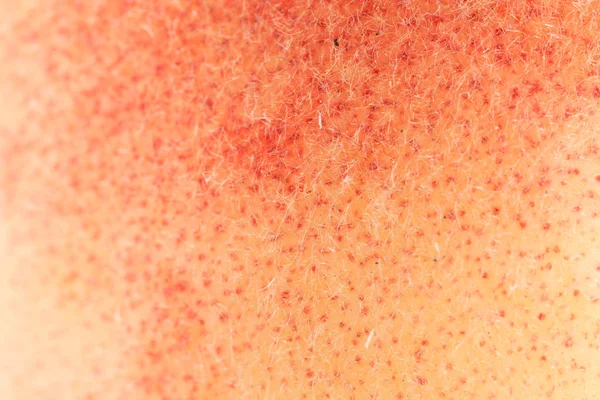 Huden på persika som bakgrund. Stäng — Stockfoto