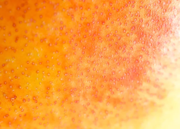 The skin of the peach as a background. close — Stock Photo, Image