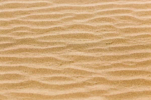 Sand als Hintergrund — Stockfoto