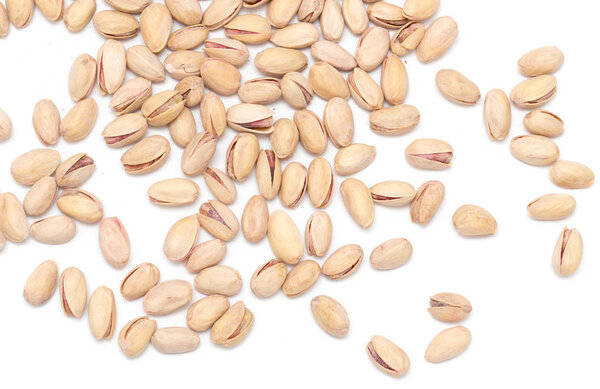 Pistachios on a white background. close . In the park in nature