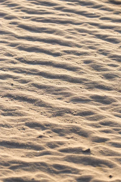Zand in de natuur als achtergrond — Stockfoto