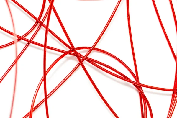 Fio vermelho em um fundo branco — Fotografia de Stock