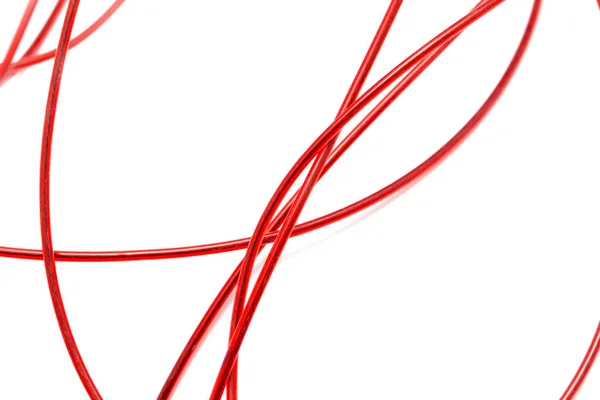 Rotes Kabel auf weißem Hintergrund — Stockfoto