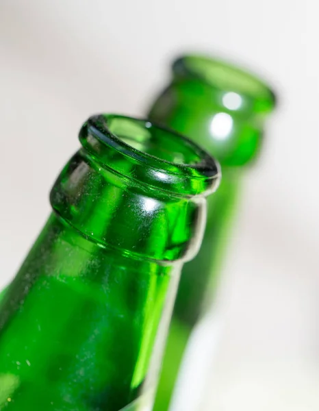 Green glass bottle neck. close — Stock Photo, Image